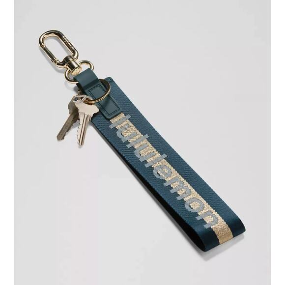 NEW Lululemon Never lost Keychain Wordmark Warp Teal Gold Blue - Picture 7 of 9